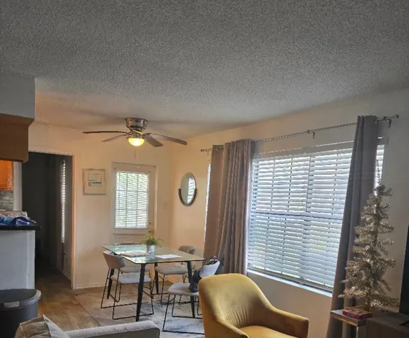 a workspace with furniture and a window