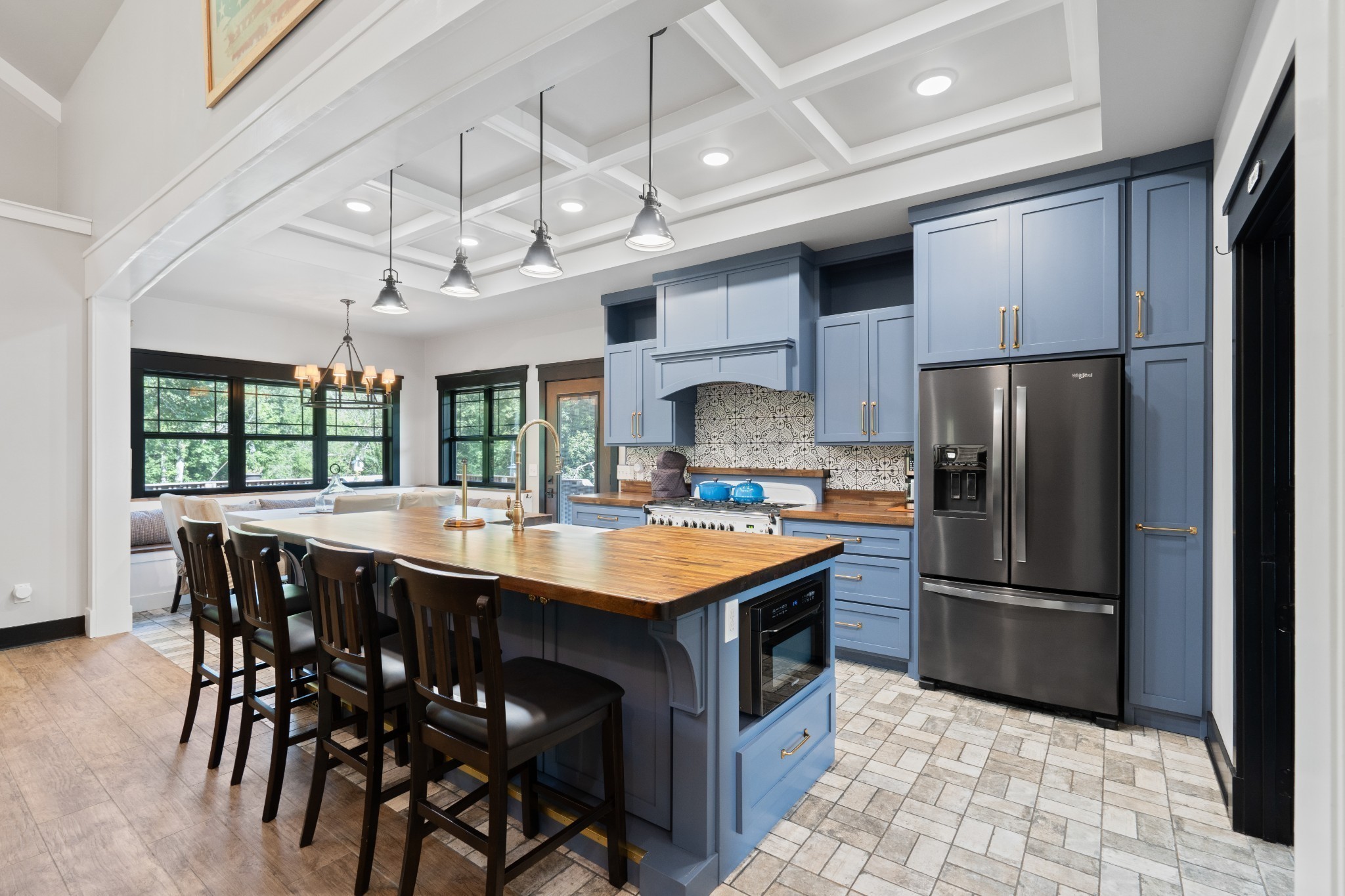 170 Rodeo Drive Columbia, TN 38401 - Photo 11 of 60 a kitchen with stainless steel appliances granite countertop a table chairs sink and refrigerator