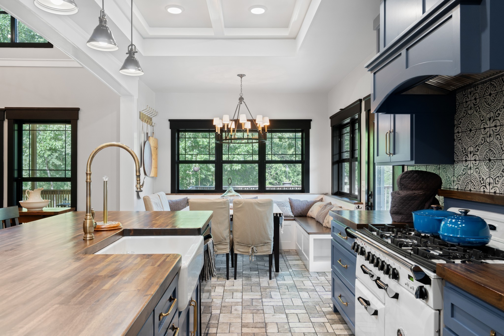 170 Rodeo Drive Columbia, TN 38401 - Photo 13 of 60 a large kitchen with a stove a chimney a sink and a dining table view