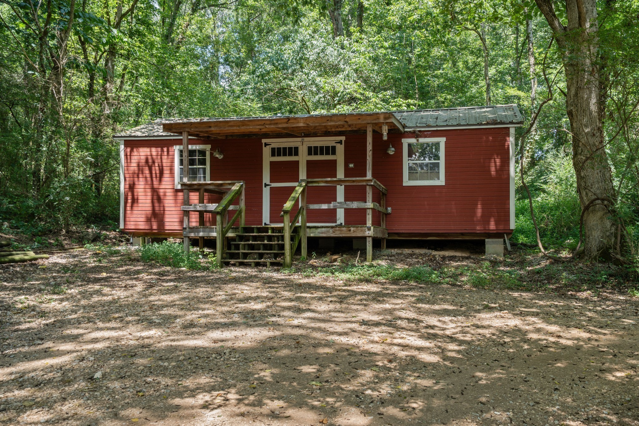 170 Rodeo Drive Columbia, TN 38401 - Photo 36 of 60 a house with lots of trees in the background