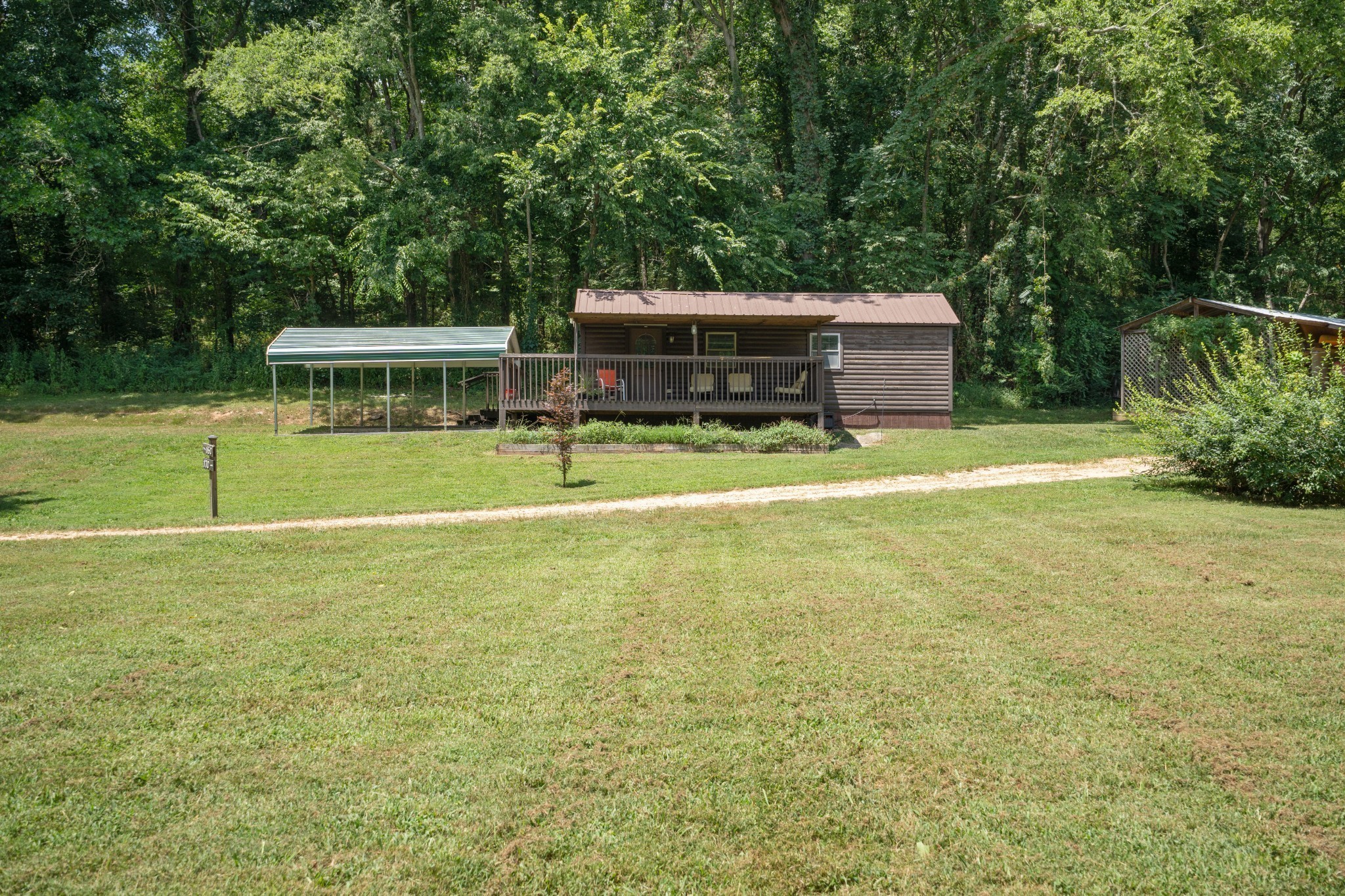 170 Rodeo Drive Columbia, TN 38401 - Photo 37 of 60 a view of a house with a yard and sitting area