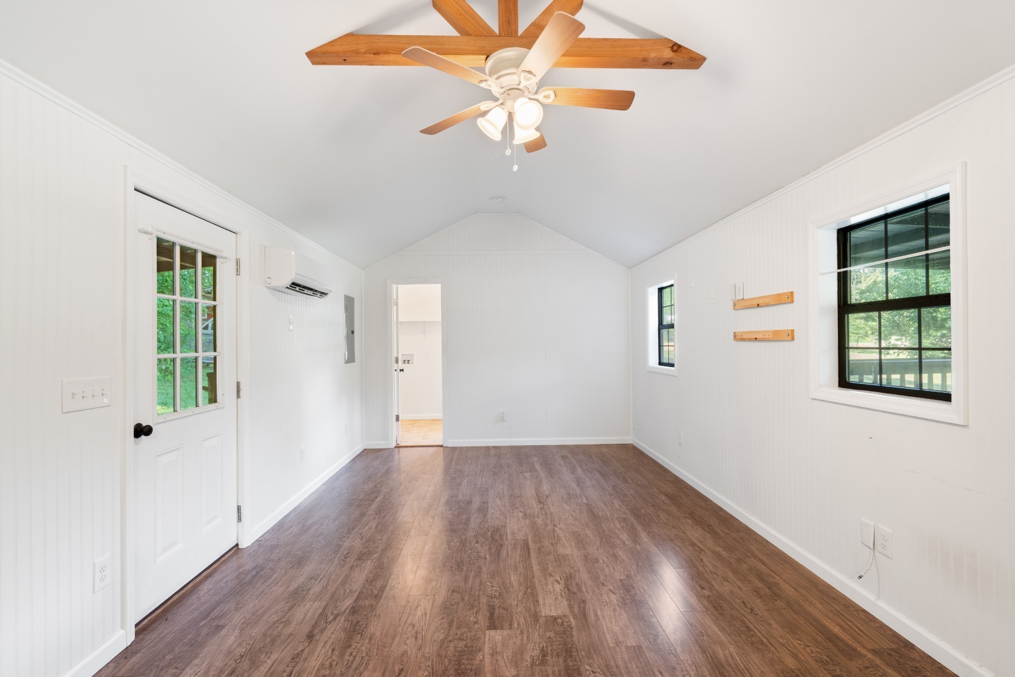 170 Rodeo Drive Columbia, TN 38401 - Photo 40 of 60 wooden floor in an empty room with a window