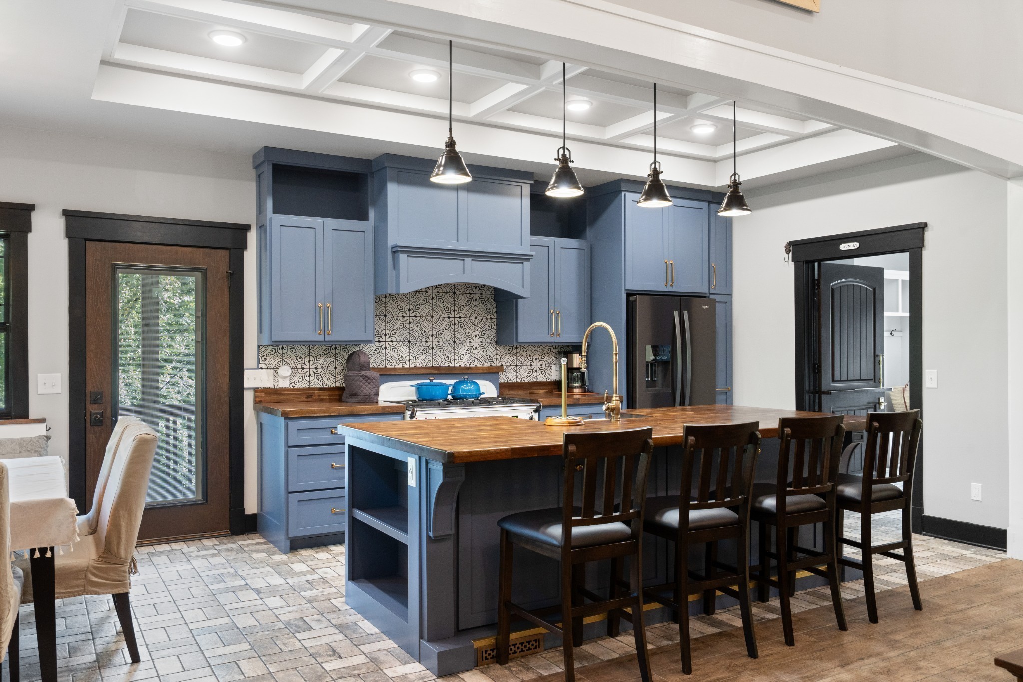 170 Rodeo Drive Columbia, TN 38401 - Photo 8 of 60 a kitchen with stainless steel appliances a table chairs and a refrigerator