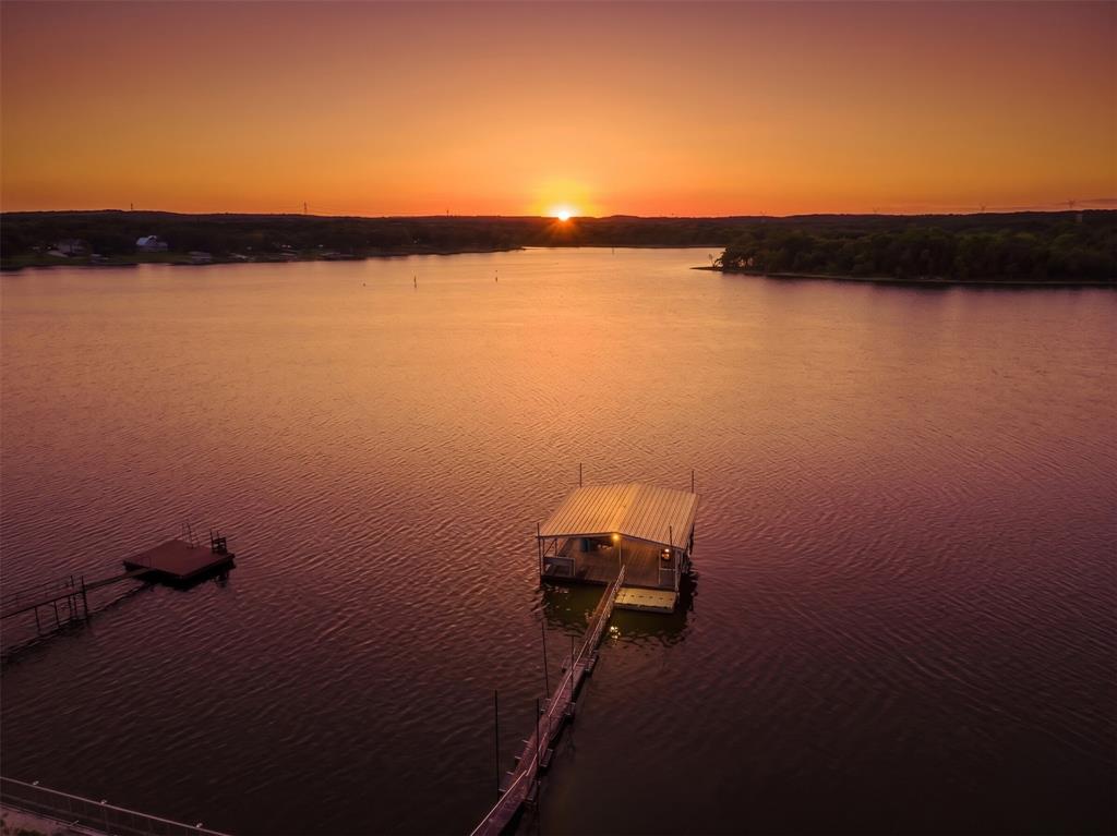 566 Selma Park Road Bowie, TX 76230 - Photo 38 of 40 Private covered boat dock with an extended walkway and separate floating platform