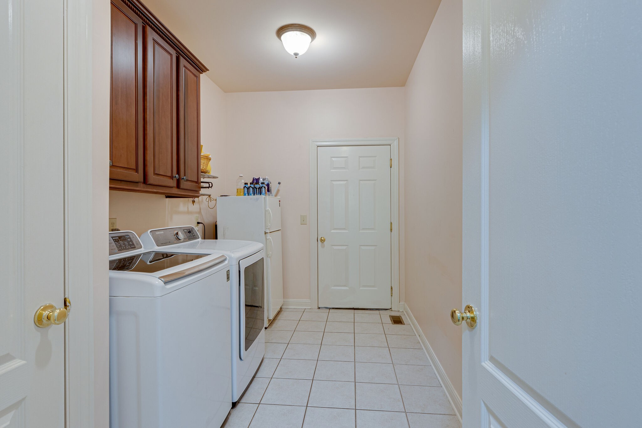 1457 Center Star Road Columbia, TN 38401 - Photo 27 of 45 a view of a kitchen with sink and washing machine
