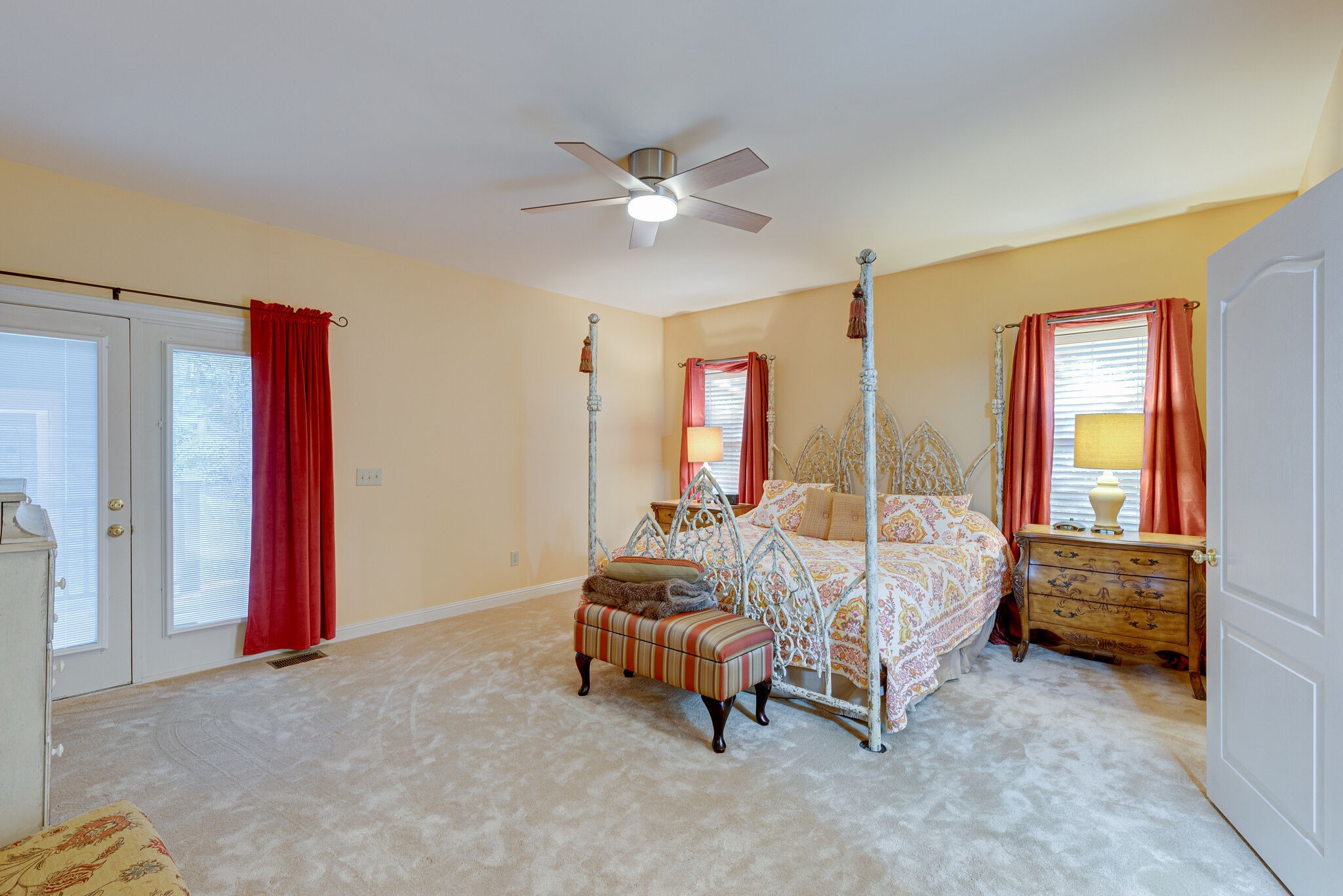 1457 Center Star Road Columbia, TN 38401 - Photo 28 of 45 a bedroom with bed and a chandelier