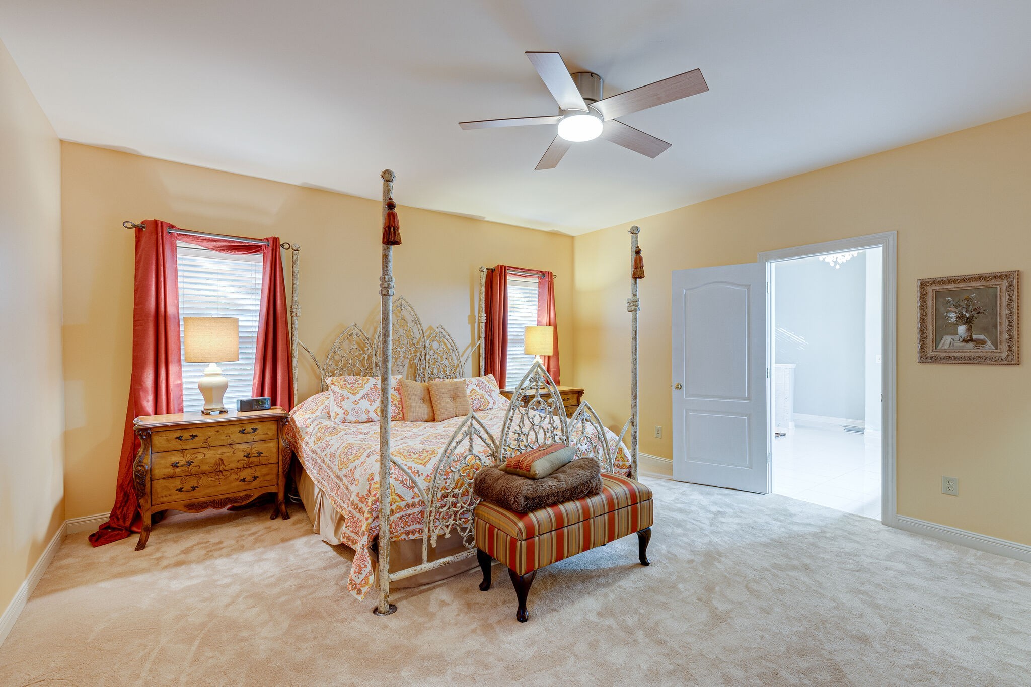 1457 Center Star Road Columbia, TN 38401 - Photo 30 of 45 a bedroom with a bed and a chandelier