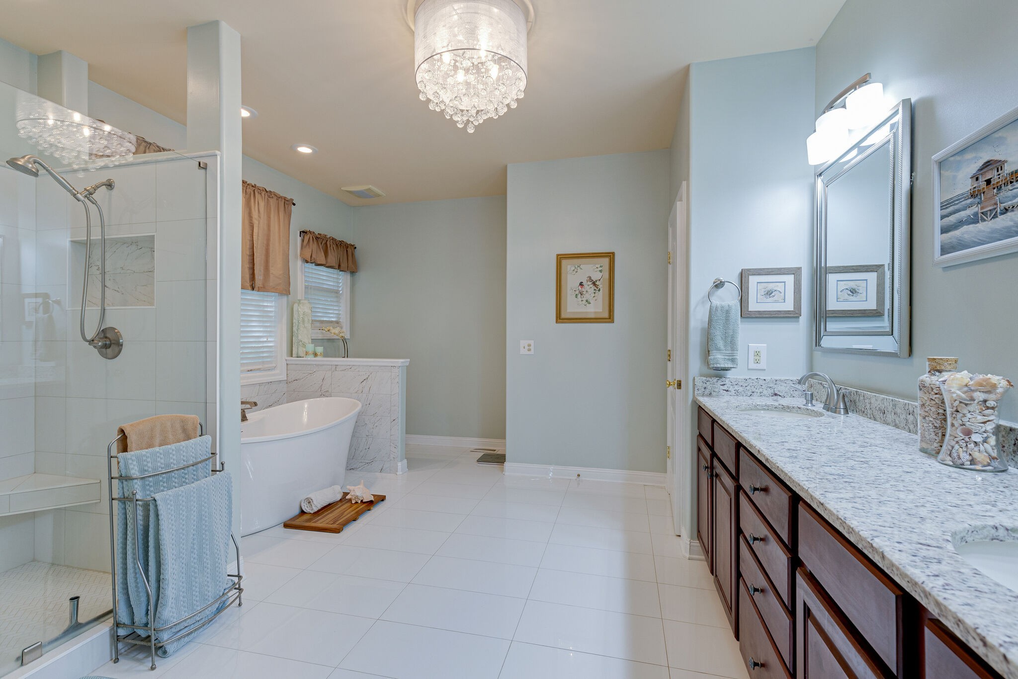 1457 Center Star Road Columbia, TN 38401 - Photo 31 of 45 a bath room with a granite countertop sink and a mirror