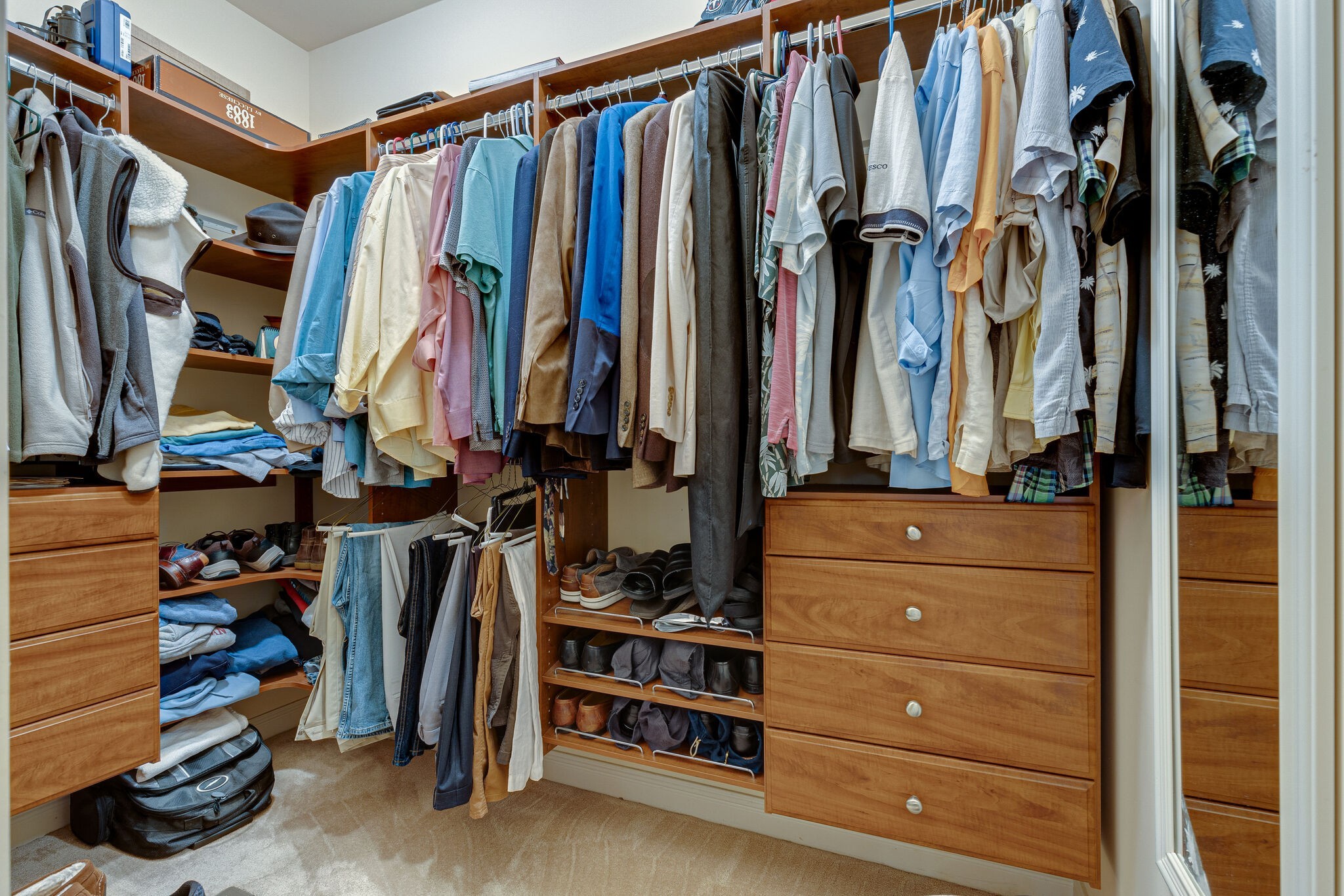 1457 Center Star Road Columbia, TN 38401 - Photo 34 of 45 a view of walk in closet with clothes and shoes
