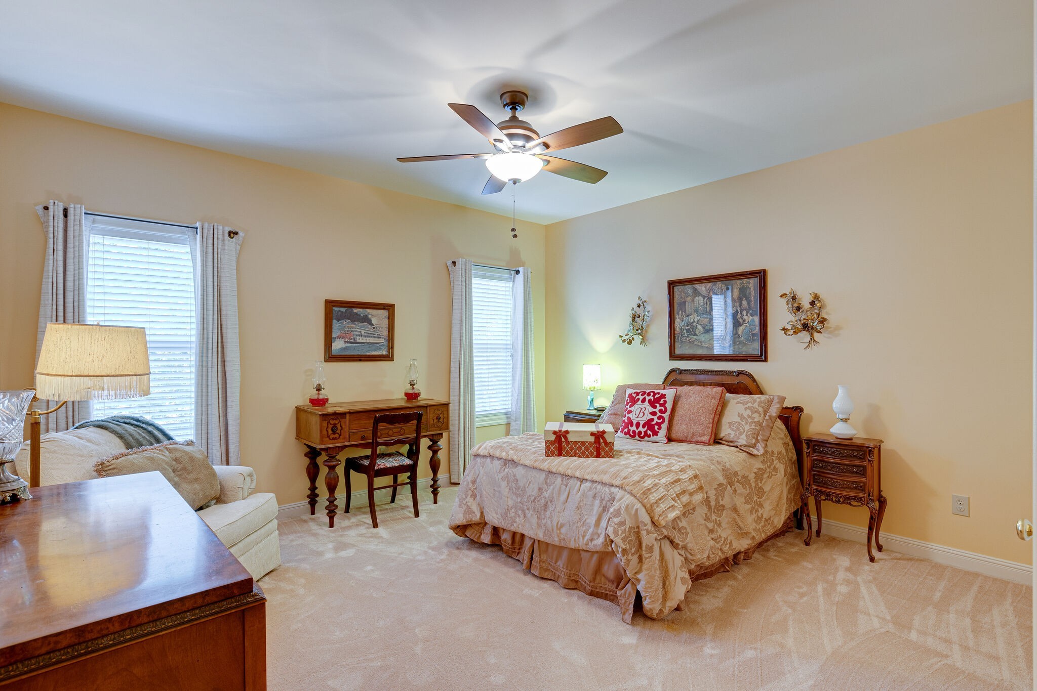 1457 Center Star Road Columbia, TN 38401 - Photo 35 of 45 a bedroom with a bed and a chandelier