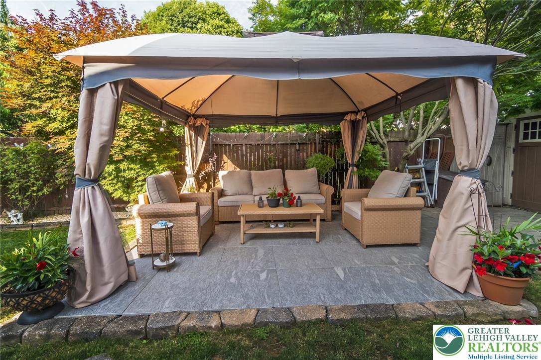 365 Rock Street Easton, PA 18042 - Photo 36 of 50 An inviting covered patio offers a comfortable outdoor living space for relaxation and entertainment.