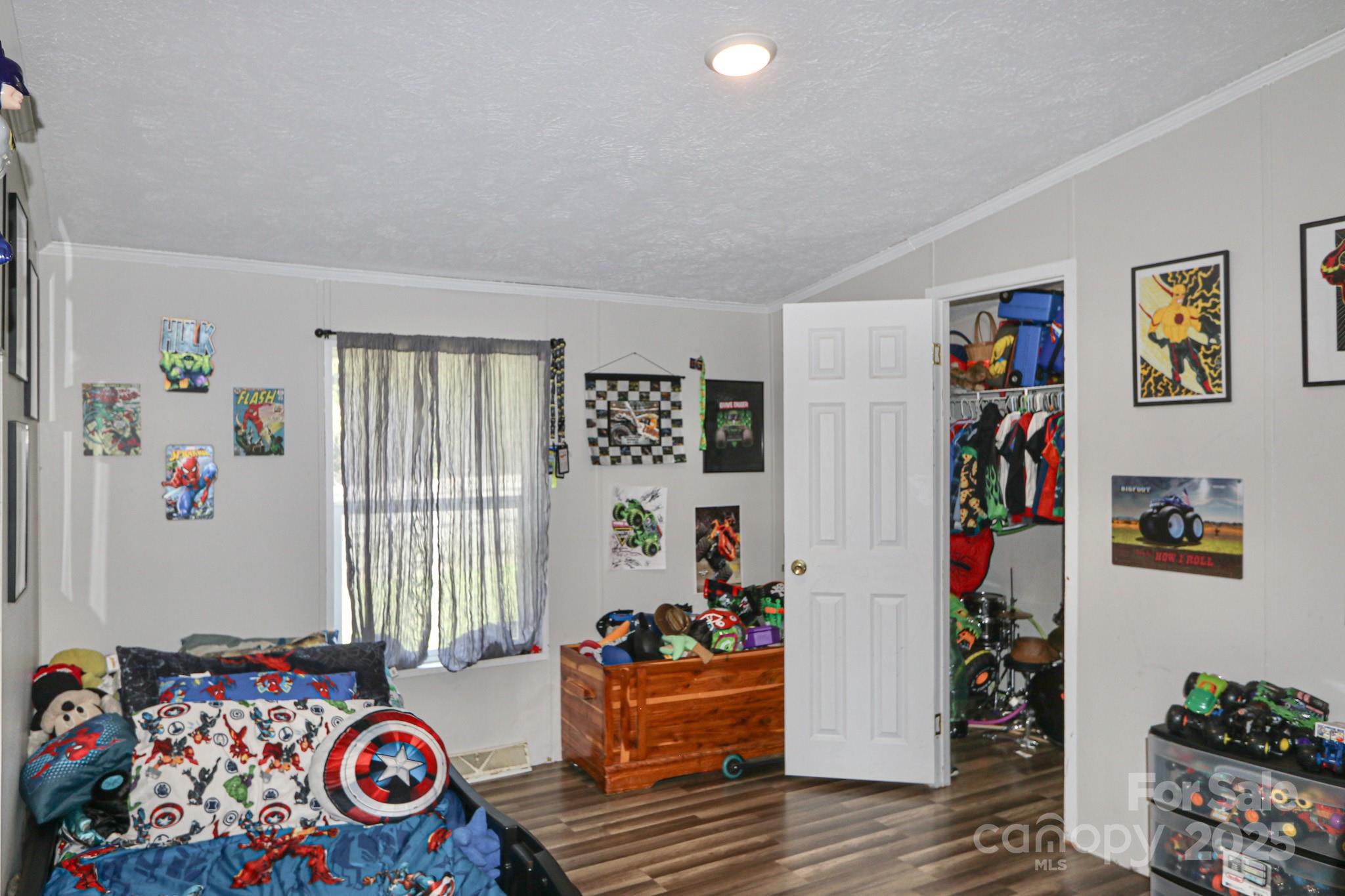 112 Courtney Road Mocksville, NC 27028 - Photo 17 of 31 a bedroom with furniture and a window