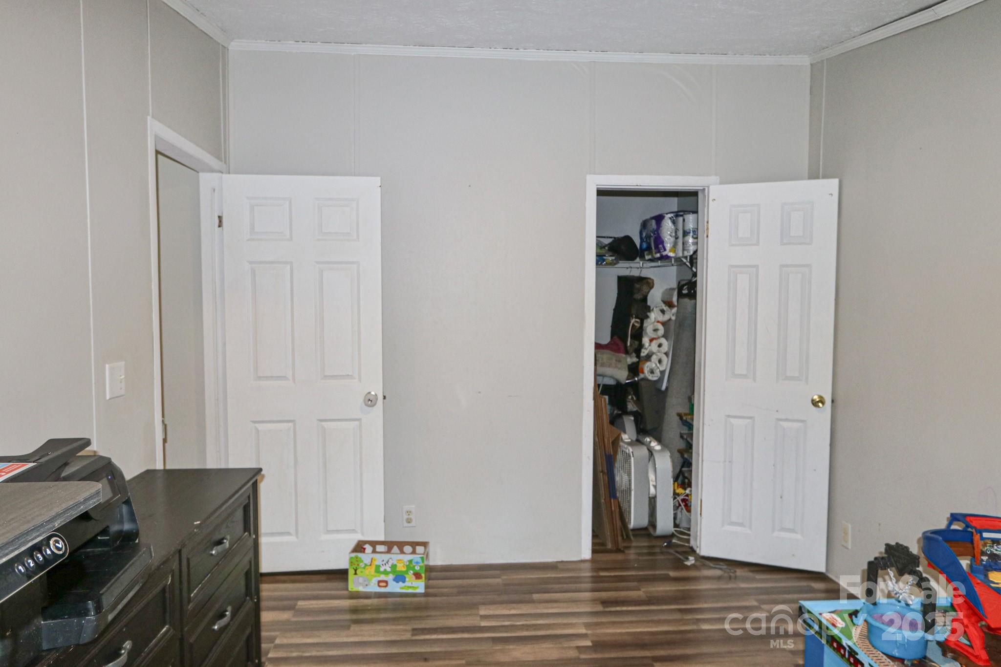 112 Courtney Road Mocksville, NC 27028 - Photo 20 of 31 a view of room with window and wooden floor
