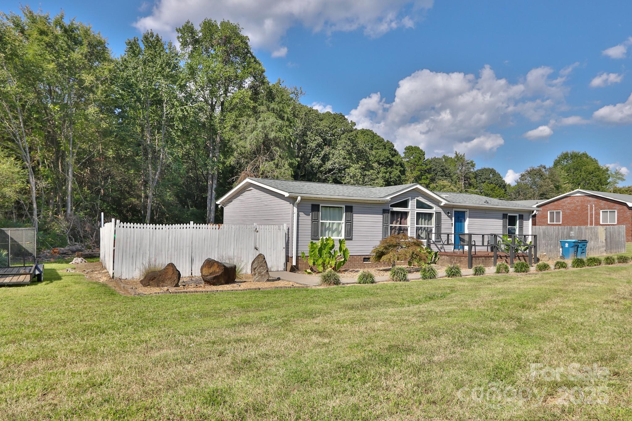 112 Courtney Road Mocksville, NC 27028 - Photo 28 of 31 a view of a house with backyard