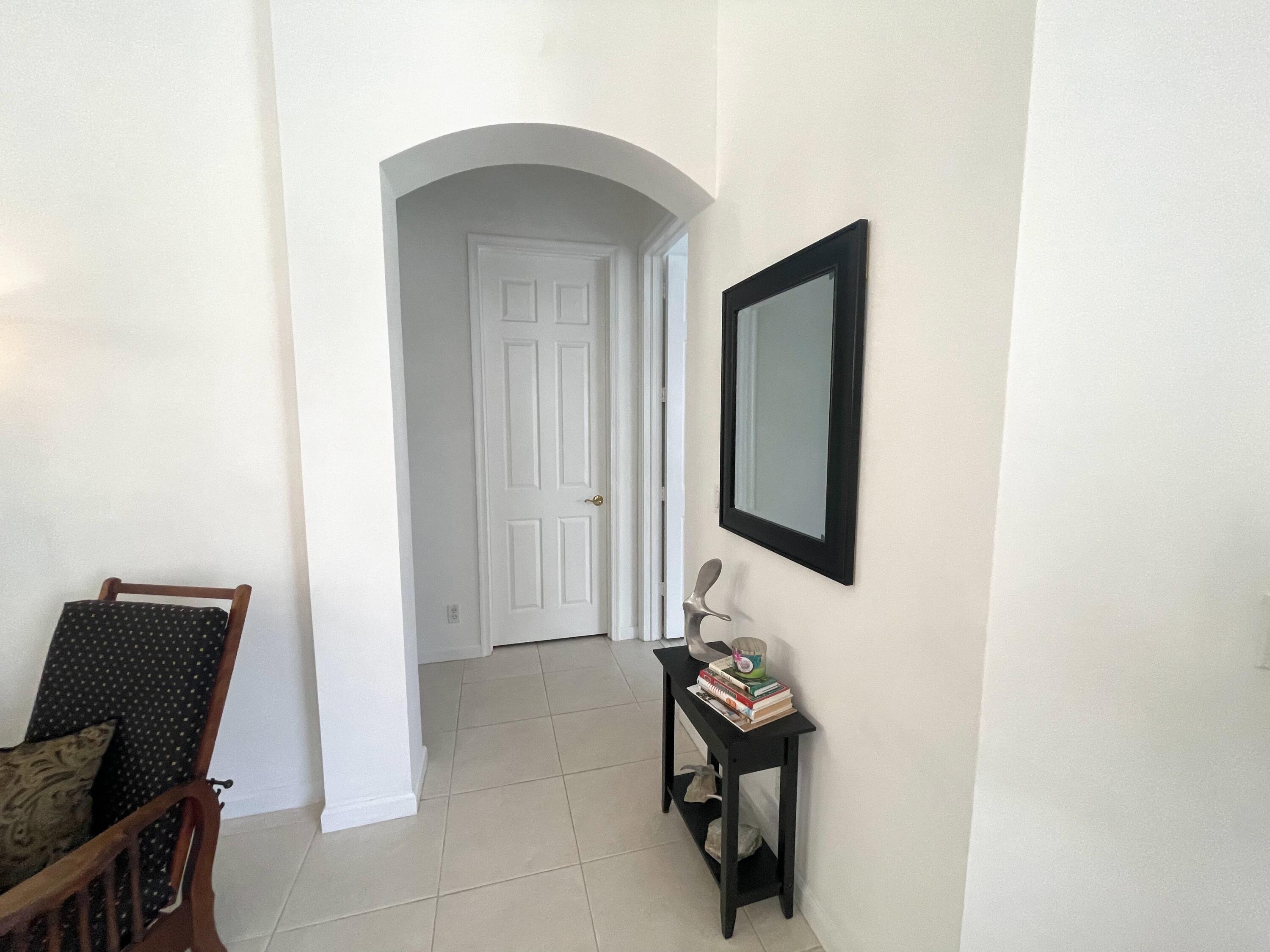 7060 Northwest Turtle Walk Boca Raton, FL 33487 - Photo 31 of 51 Hallway to Bedrooms