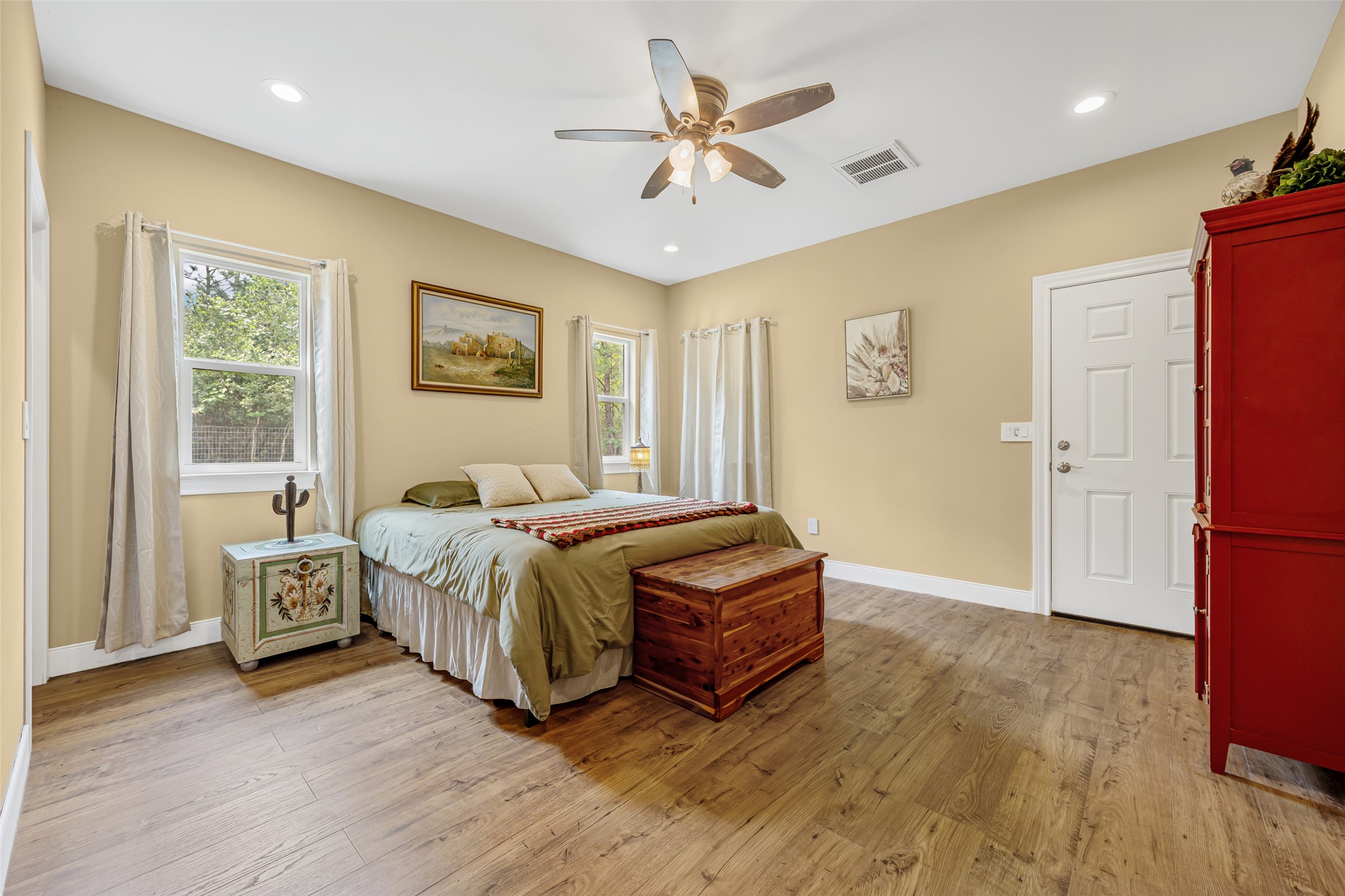198 Kelley Road East Bastrop, TX 78602 - Photo 18 of 38 Primary bedroom with direct access to your private back porch