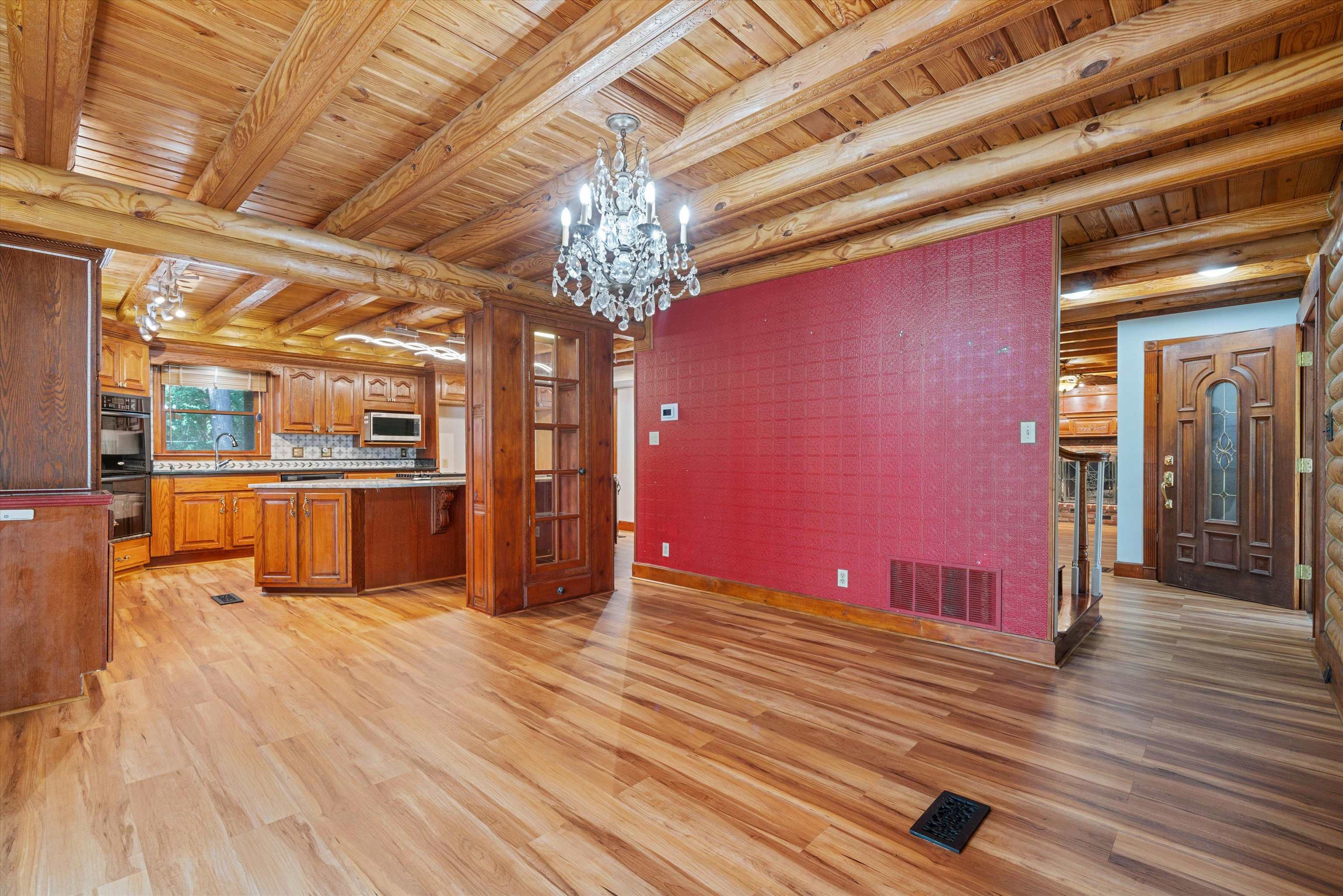 245 Metro Road Eads, TN 38028 - Photo 21 of 33 Kitchen featuring wooden ceiling, light hardwood / wood-style flooring, sink, a chandelier, and double oven