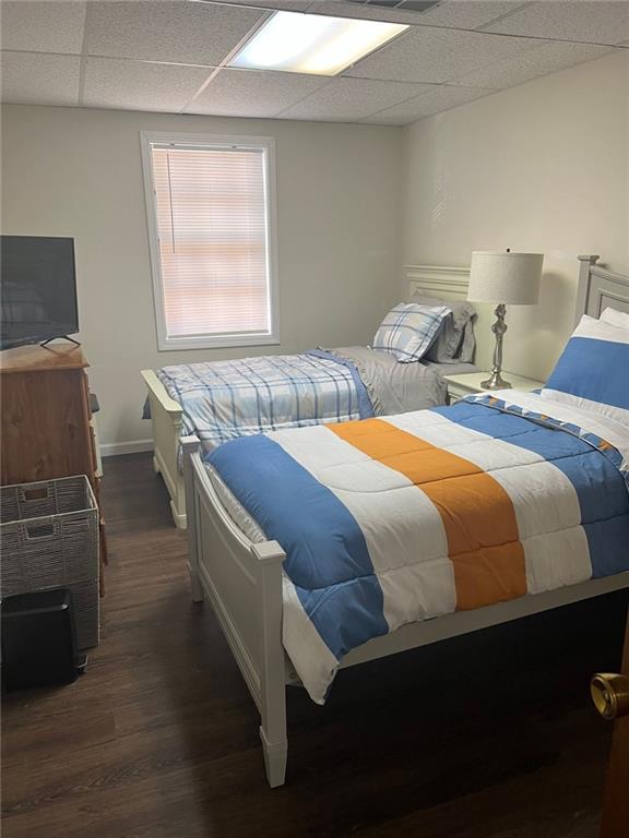 5865 Vernier Drive Southwest Atlanta, GA 30349 - Photo 27 of 33 a bedroom with two beds and wooden floor