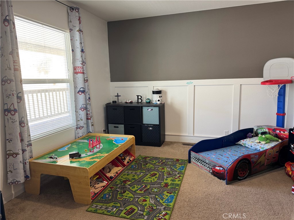 657 Lebec Road, Unit 36 Lebec, CA 93243 - Photo 15 of 20 a bedroom with a bed and a table in it