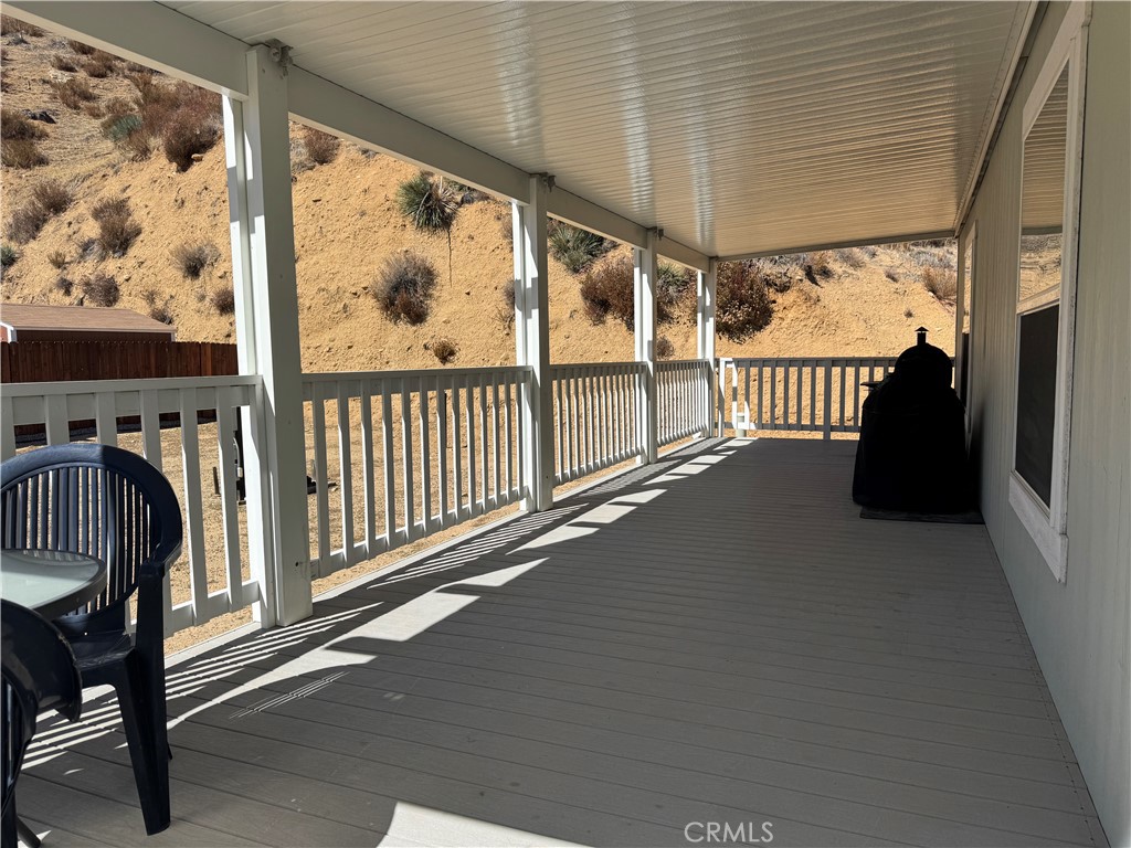 657 Lebec Road, Unit 36 Lebec, CA 93243 - Photo 17 of 20 a view of a porch with wooden floor and outdoor space
