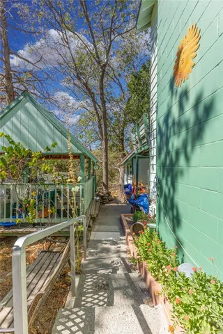 a view of a chairs and table in the patio