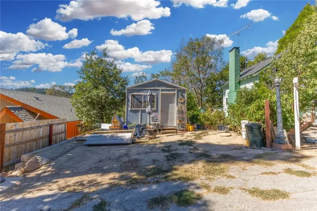 an aerial view of residential house with outdoor space