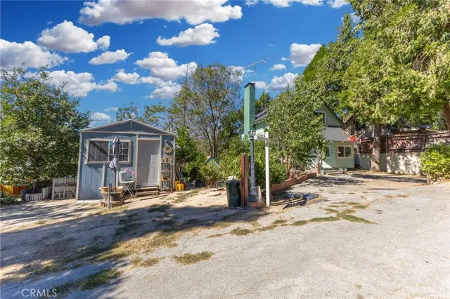 an aerial view of multiple house with outdoor space
