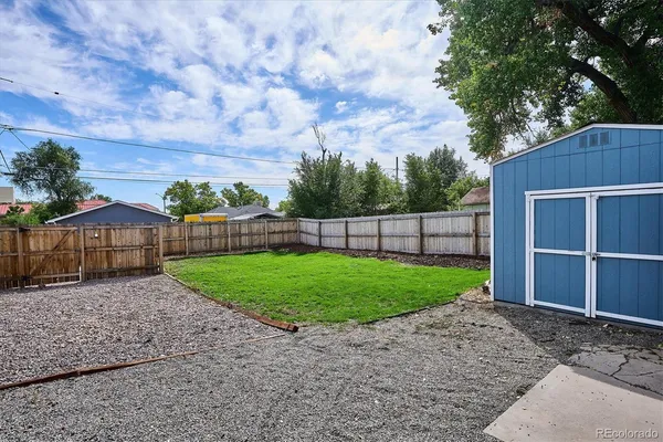 a view of backyard with green space