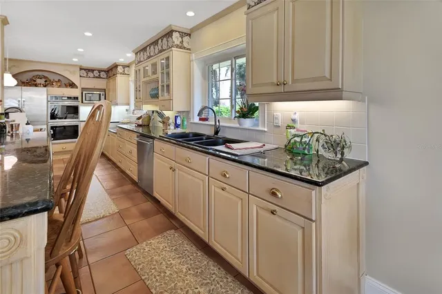 a bed room with furniture and a chandelier