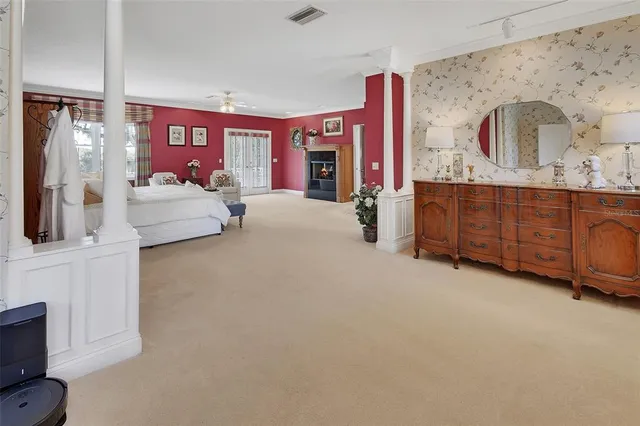 a bathroom with a granite countertop sink mirror and a shower