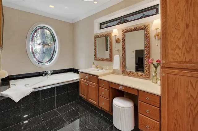 a view of a swimming pool with an outdoor space and seating area