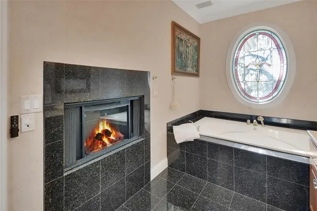 a living room with furniture rug and window