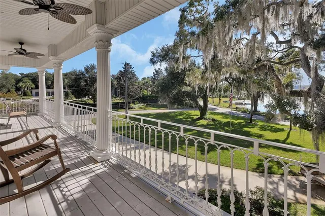 a bathroom with a double vanity sink toilet and shower