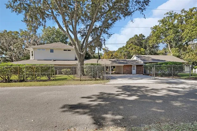 a view of a patio with swimming pool