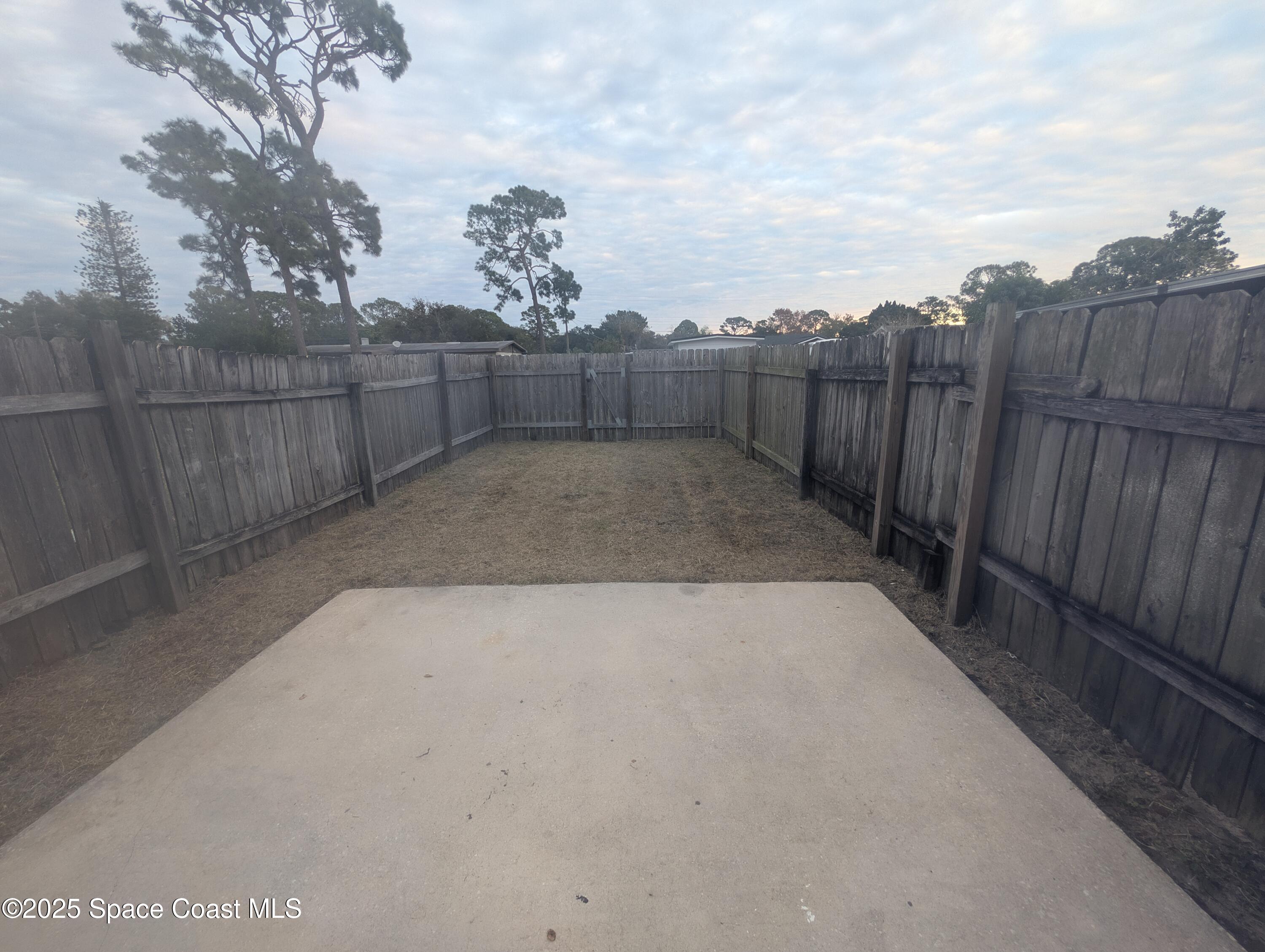 4801 Sisson Road Titusville, FL 32780 - Photo 21 of 21 a view of a backyard