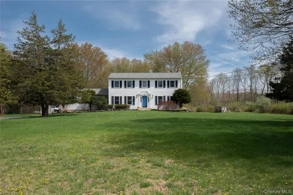a view of a house with a big yard
