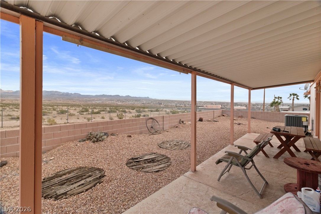 1609 Cajon Court Laughlin, NV 89029 - Photo 36 of 69 Fenced backyard with a patio and a mountain view