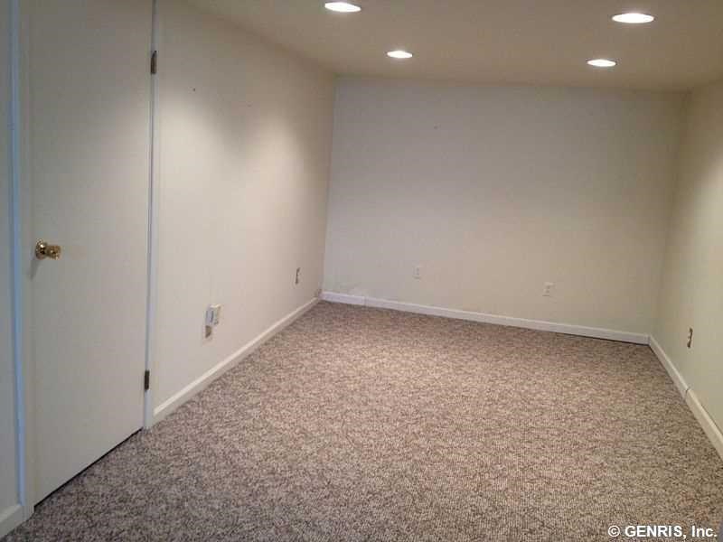 15 Maple Street Pittsford, NY 14534 - Photo 17 of 24 Second finished room in bsmt with new carpet