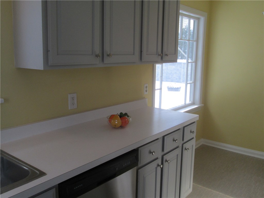 15 Maple Street Pittsford, NY 14534 - Photo 3 of 24 Freshly painted cupboards and new stainless dishwa