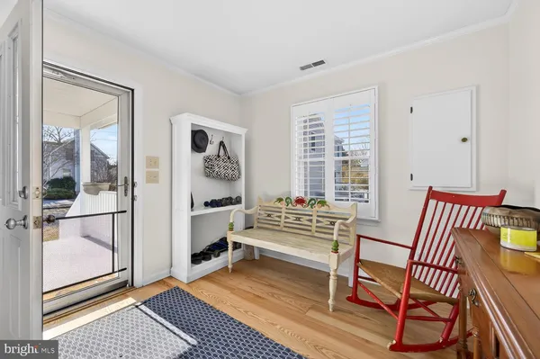 a view of a livingroom with furniture and windows