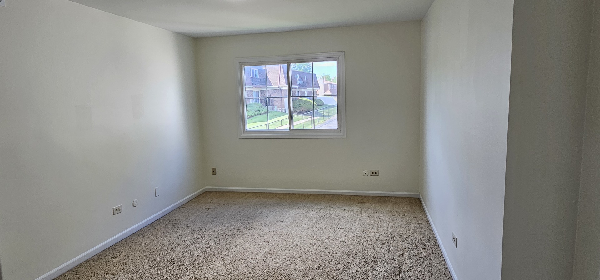 833 Village Quarter Road, Unit A3 West Dundee, IL 60118 - Photo 20 of 27 an empty room with a window