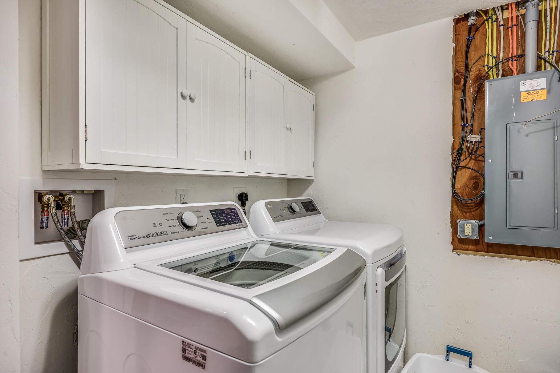 25 Locust Road Eastham, MA 02642 - Photo 29 of 41 a utility room with dryer and washer