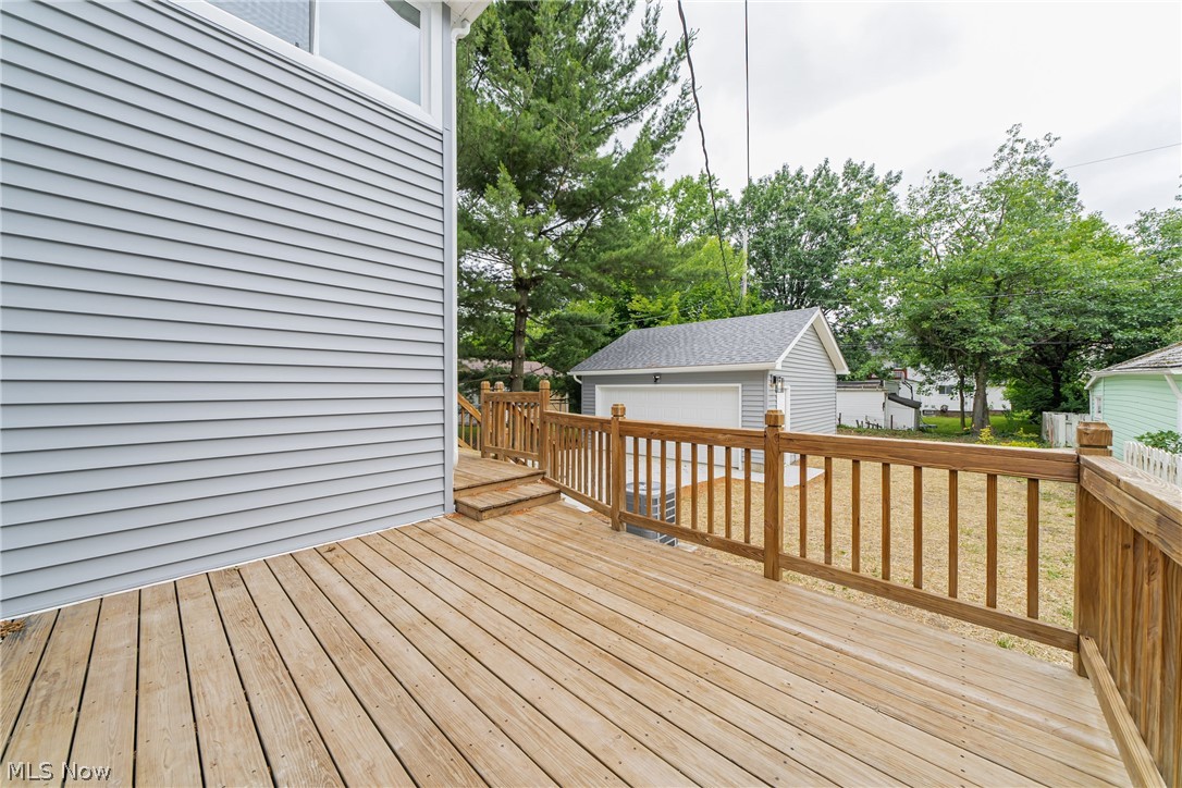 3947 Rosemond Road Cleveland Heights, OH 44121 - Photo 39 of 44 Wooden terrace with an outdoor structure and a garage