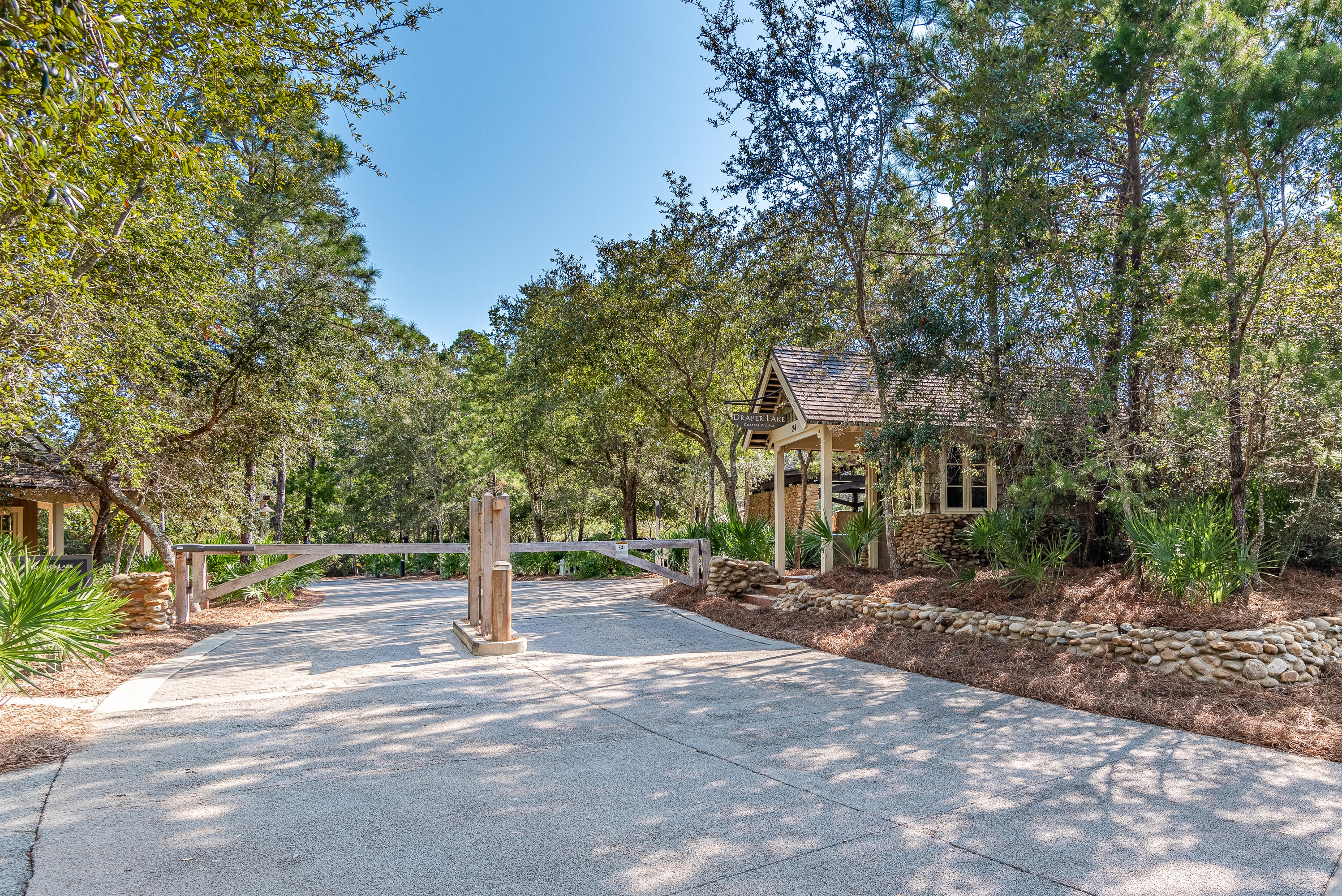 53 Cedar Post Road Santa Rosa Beach, FL 32459 - Photo 36 of 37 a street view with large trees