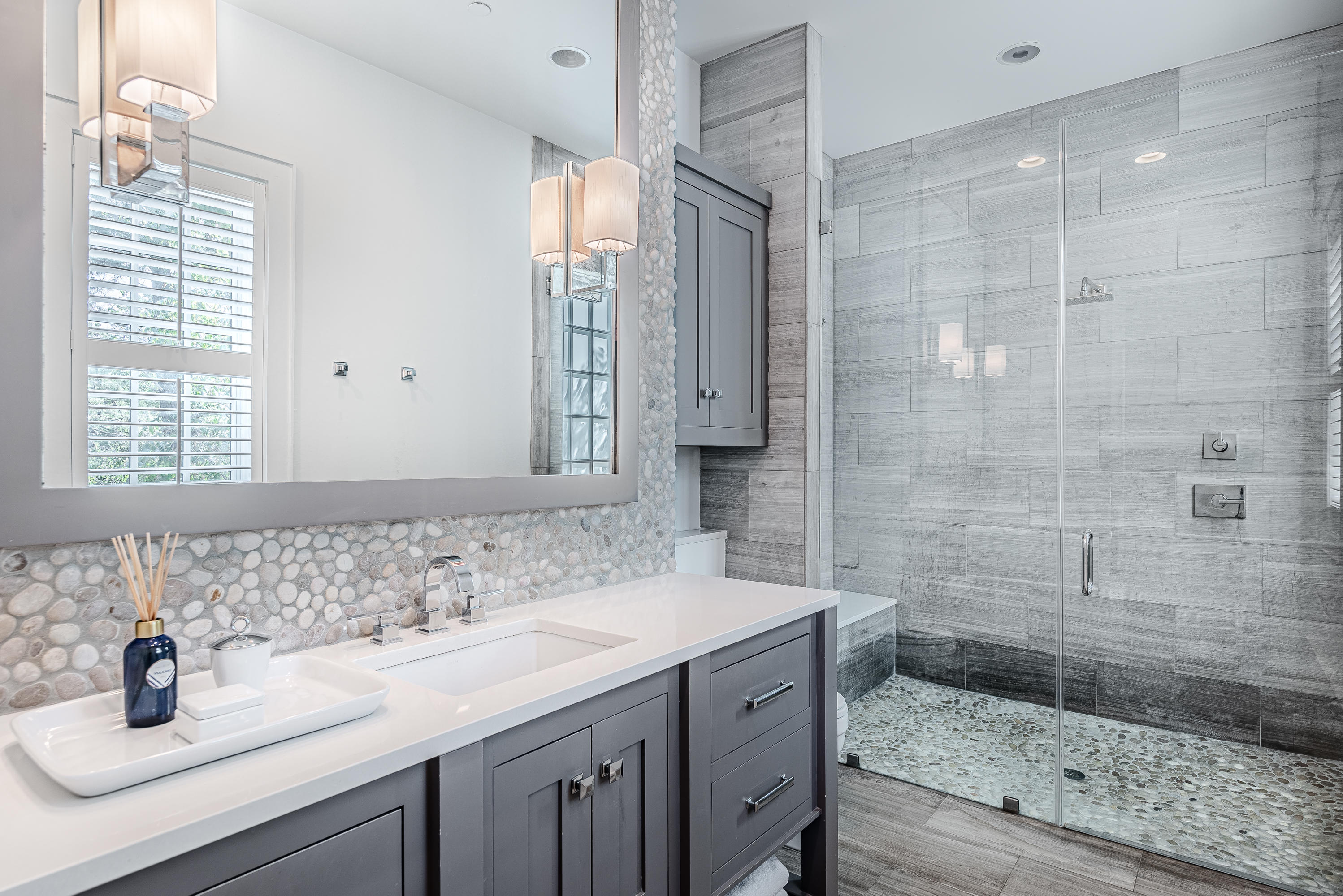 53 Cedar Post Road Santa Rosa Beach, FL 32459 - Photo 10 of 37 a bathroom with a shower sink and mirror