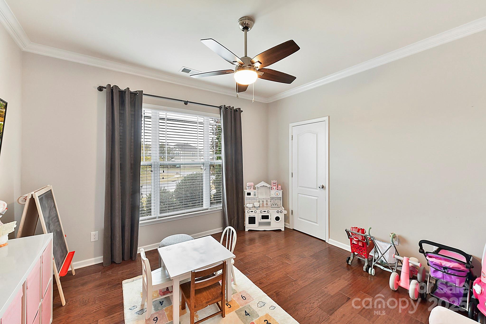 1084 Cameron Creek Parkway Tega Cay, SC 29708 - Photo 17 of 25 a living room with furniture and a flat screen tv