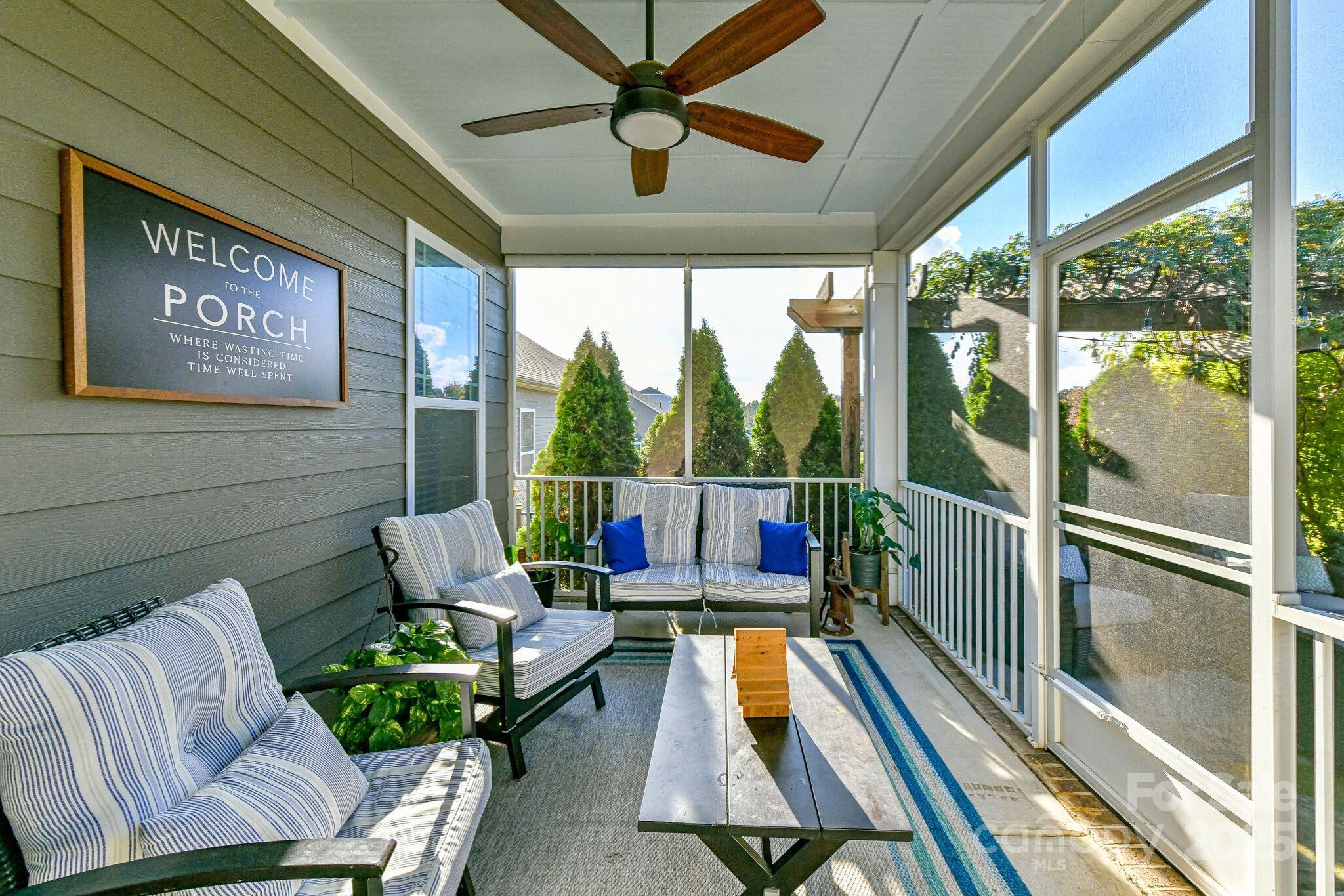 1084 Cameron Creek Parkway Tega Cay, SC 29708 - Photo 21 of 25 a living room with furniture and a large window