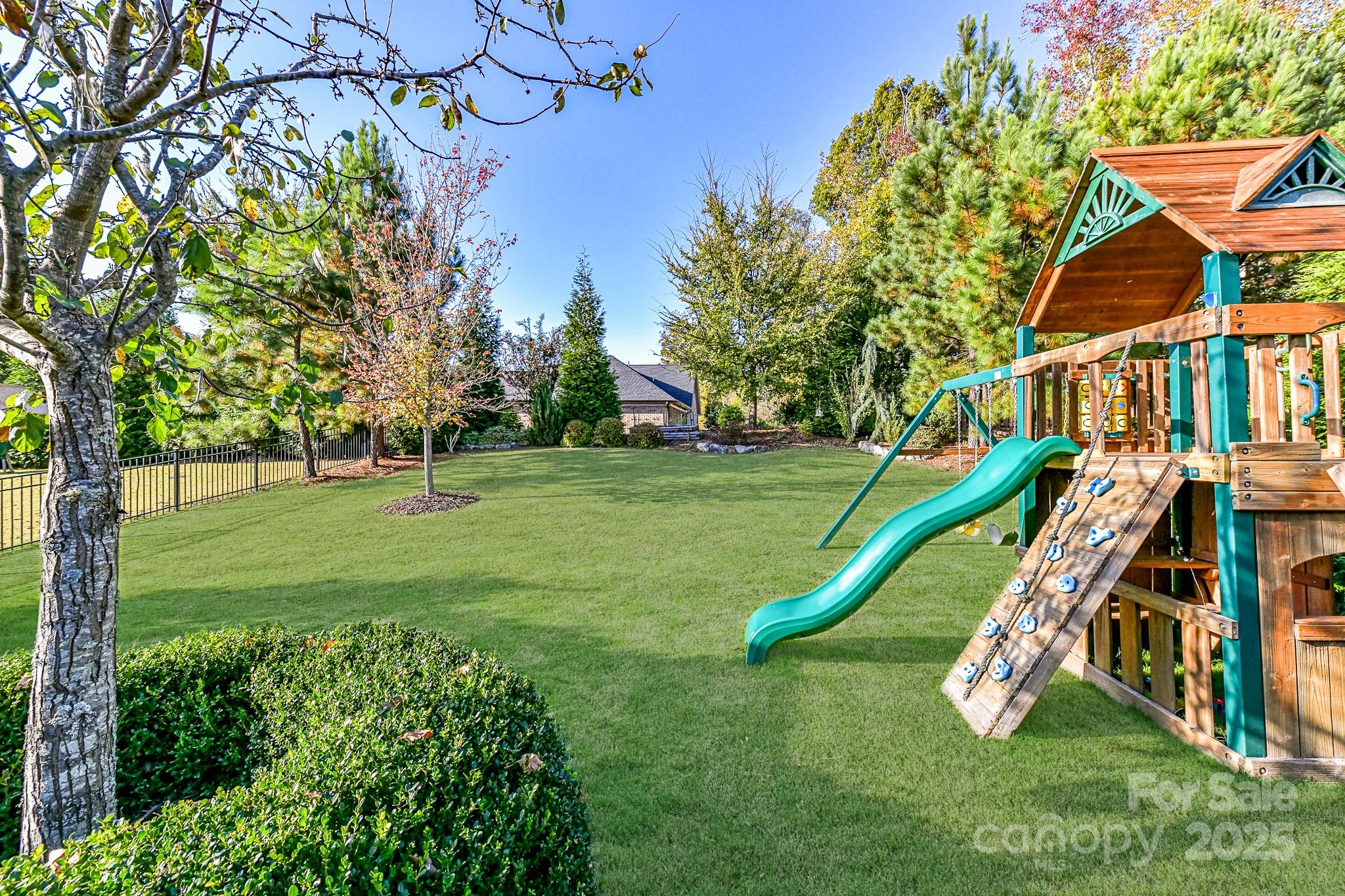 1084 Cameron Creek Parkway Tega Cay, SC 29708 - Photo 23 of 25 a view of a house with a park