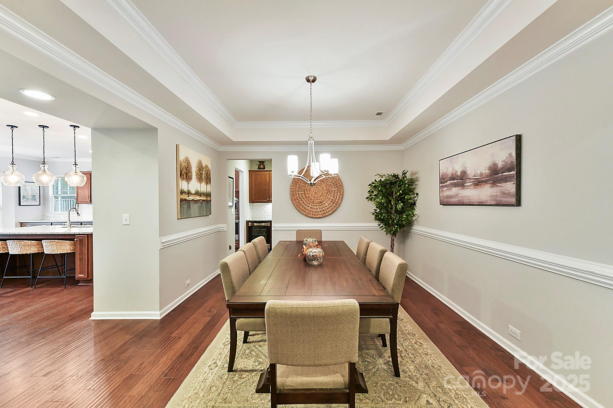 1084 Cameron Creek Parkway Tega Cay, SC 29708 - Photo 3 of 25 a view of a dining room with furniture window and wooden floor