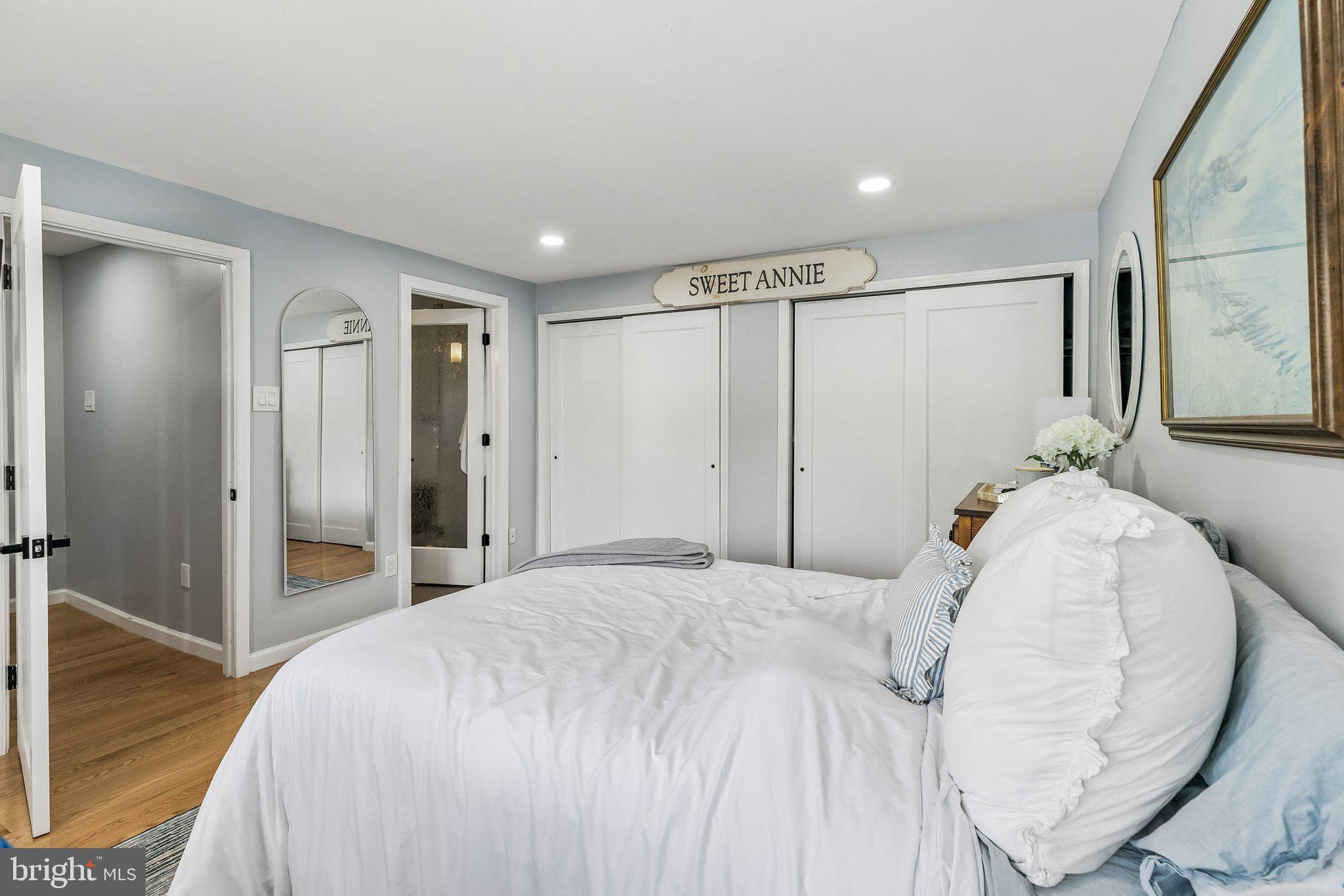 1130 Lombard Street Philadelphia, PA 19147 - Photo 18 of 45 a bedroom with a bed and a mirror